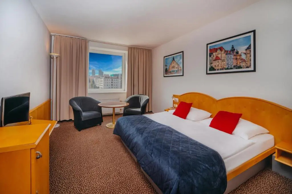 Cosmopolitan Bobycentrum - Chambres