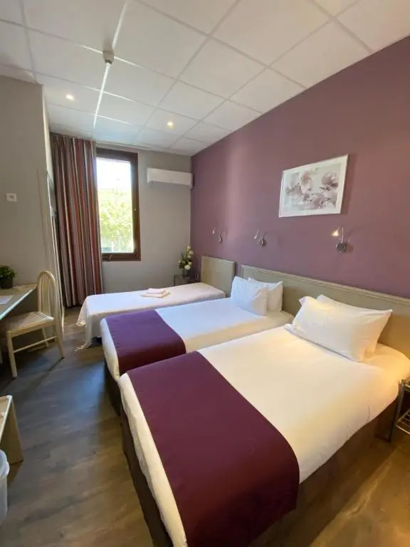 Cit'Hotel Le Louvre - Chambres