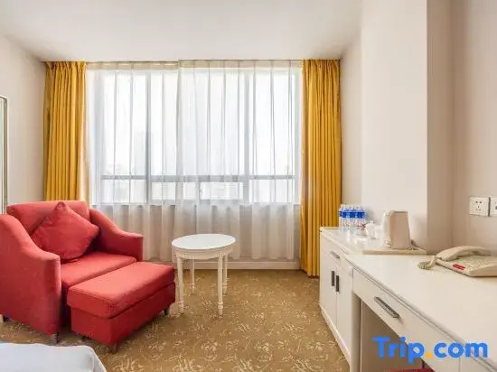 Tian Long Hotel - Chambres