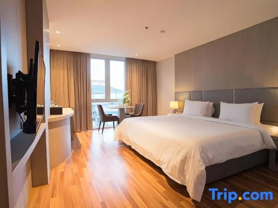 New Season Square Hotel - Chambres