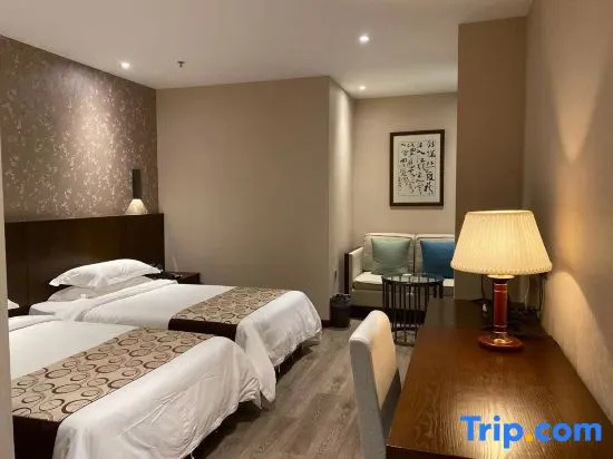 Xinhua Hotel - Chambres