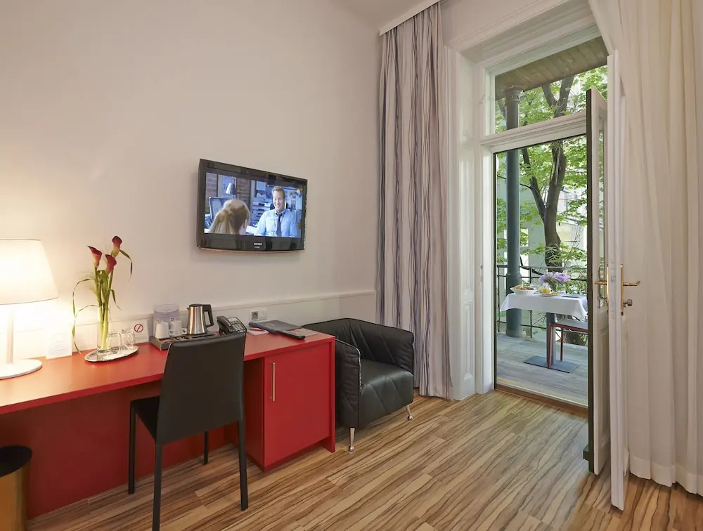 Superior Double room with balcony and with garden view (full double bed)