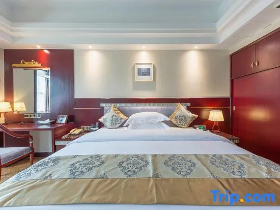 Yi Long Hotel - Chambres