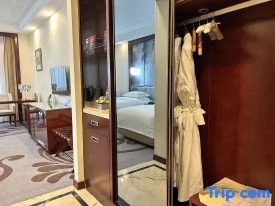 Baiyunbian Hotel - Chambres