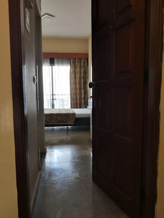 Holiday Suites Hotel And Beach - Chambres