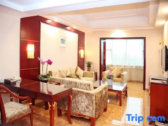Yi Long Hotel - Chambres