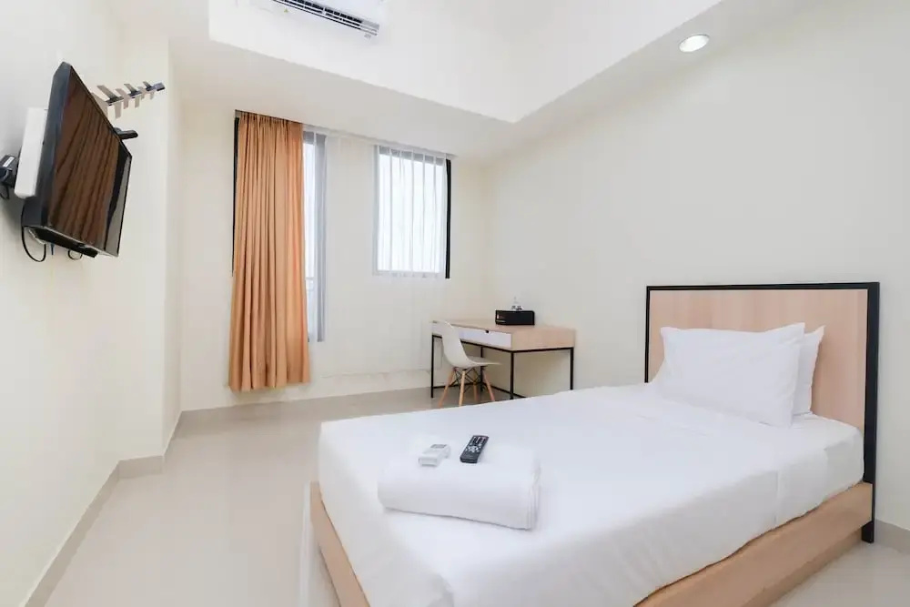 Cozy Studio at Evenciio Apartment Near UI