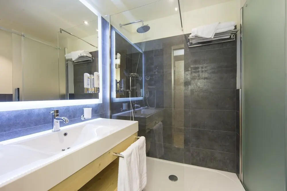AlpHoliday Dolomiti Wellness - Chambres