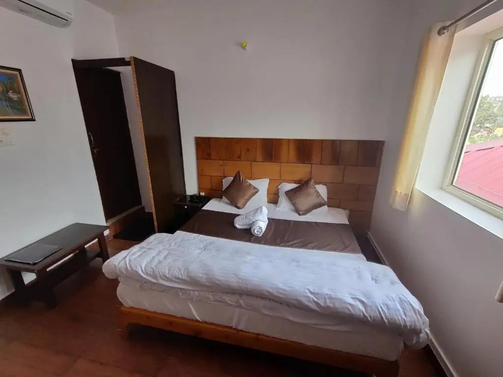 Hotel Bagora Heights - Chambres
