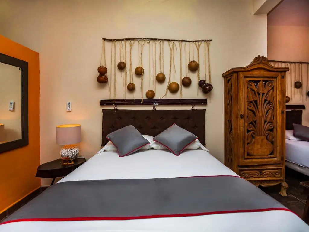 Standard Triple room with garden view