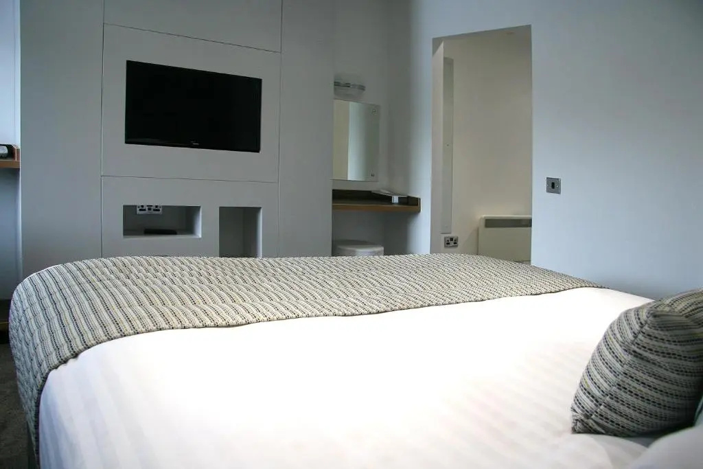 Damon's Hotel - Chambres