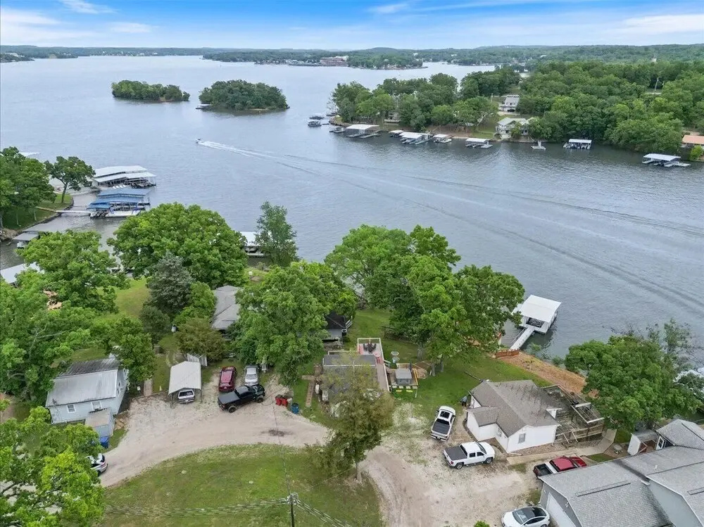 Lakefront Fishing Retreat w/ Dock, Hot Tub & Deck Views