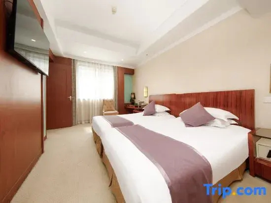 Sanyuan Hotel - Chambres
