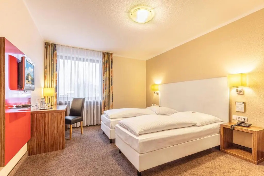 Sport - und Tagungshotel De Poort - Chambres
