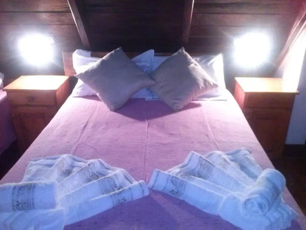 Petit Hotel Caraguata - Chambres