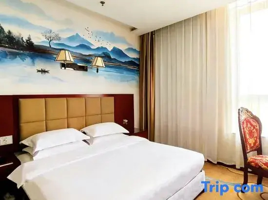 Wanjia Hotel - Chambres