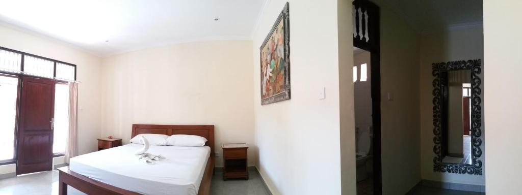 Двухместный номер Standard с красивым видом из окна двуспальная кровать в Krisda Ubud Guest House