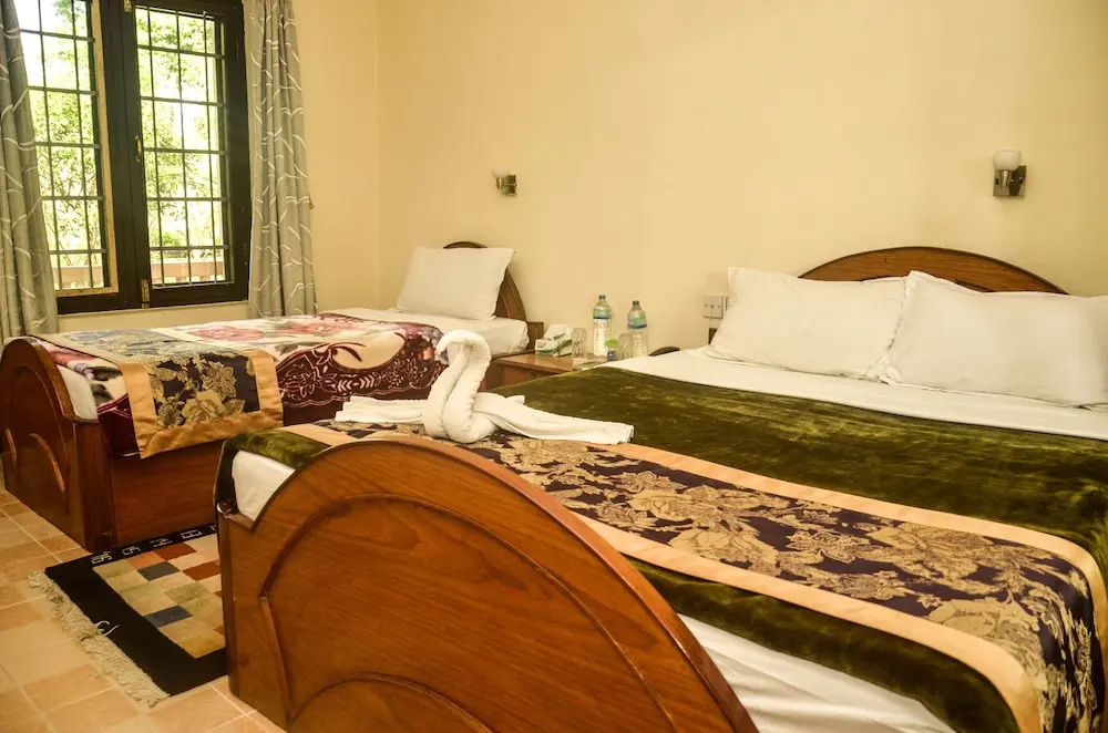 Chitwan Paradise Hotel - Chambres