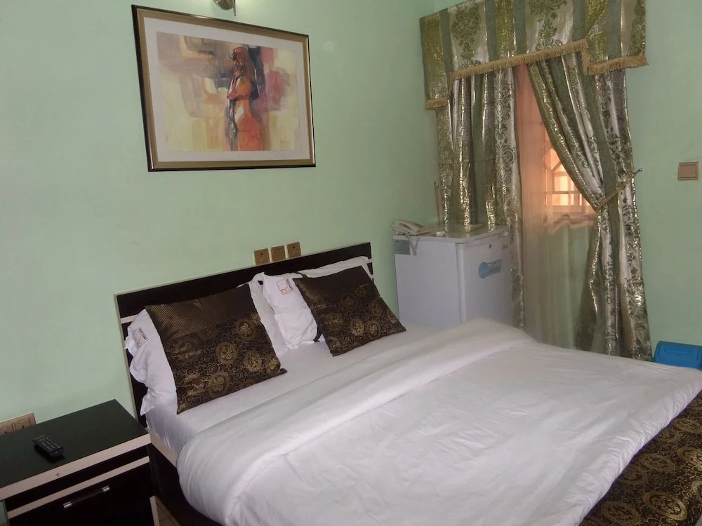 Rita's Events and Suites - Chambres