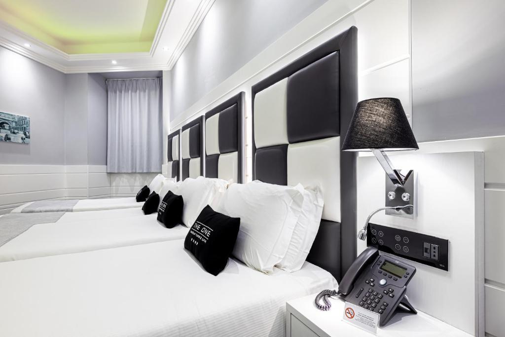 Четырёхместный номер Superior в THE ONE Boutique Hotel & SPA Rome