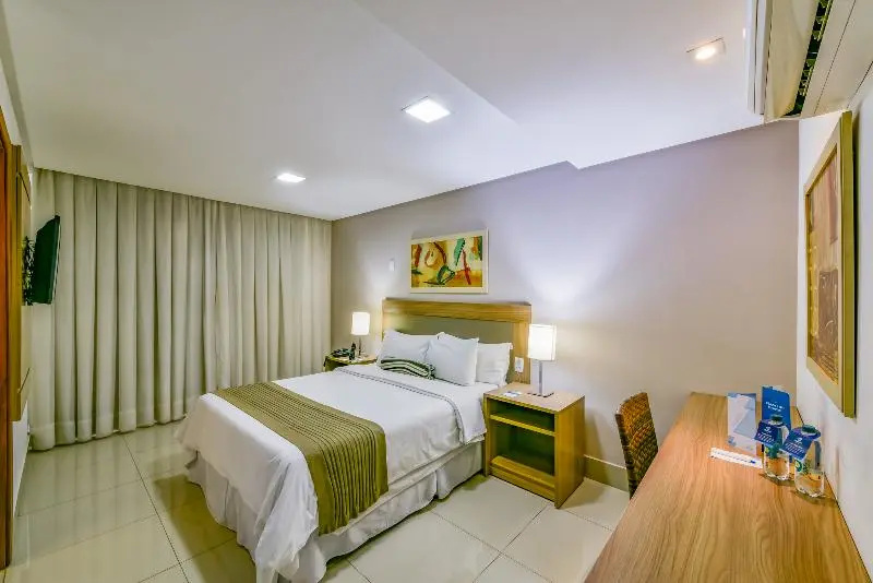 Plaza Inn Breeze Aeroporto - Chambres