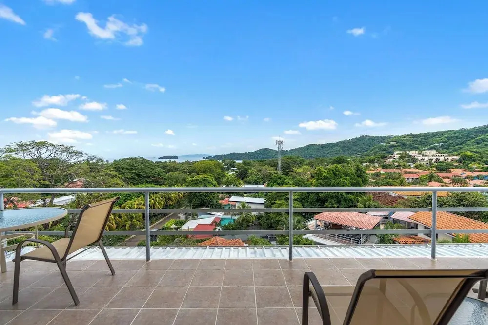 Modern Top-Floor Condo with Panoramic Views and Community Pool