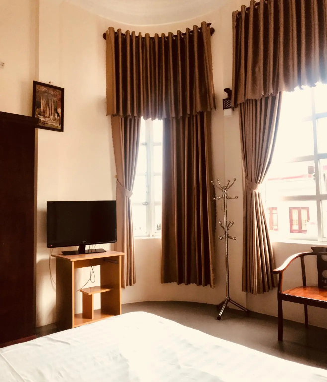 Nam Long Hotel - Chambres