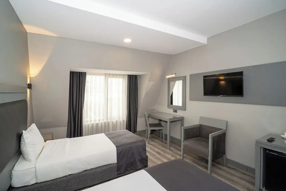 Grand S Hotel - Chambres