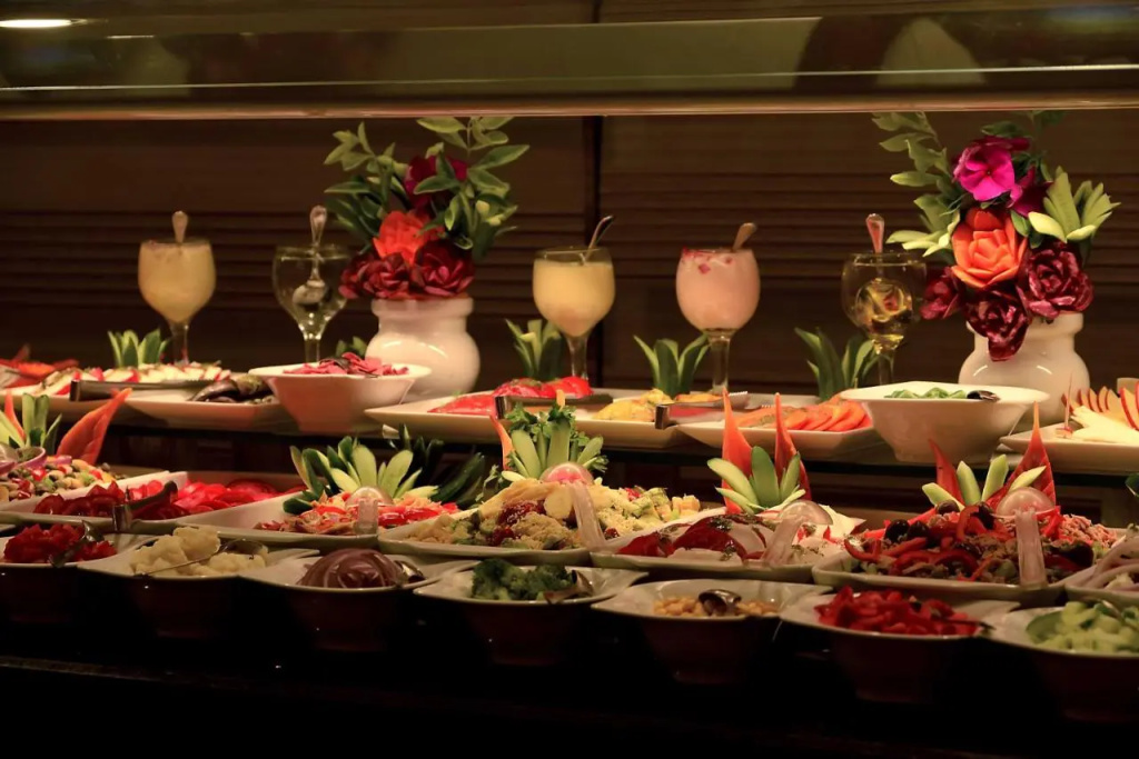 Pickalbatros Blu Spa Resort - Adults Friendly 16 Years Plus: A buffet spread features salads, fresh fruit, prepared dishes, and chilled drinks.