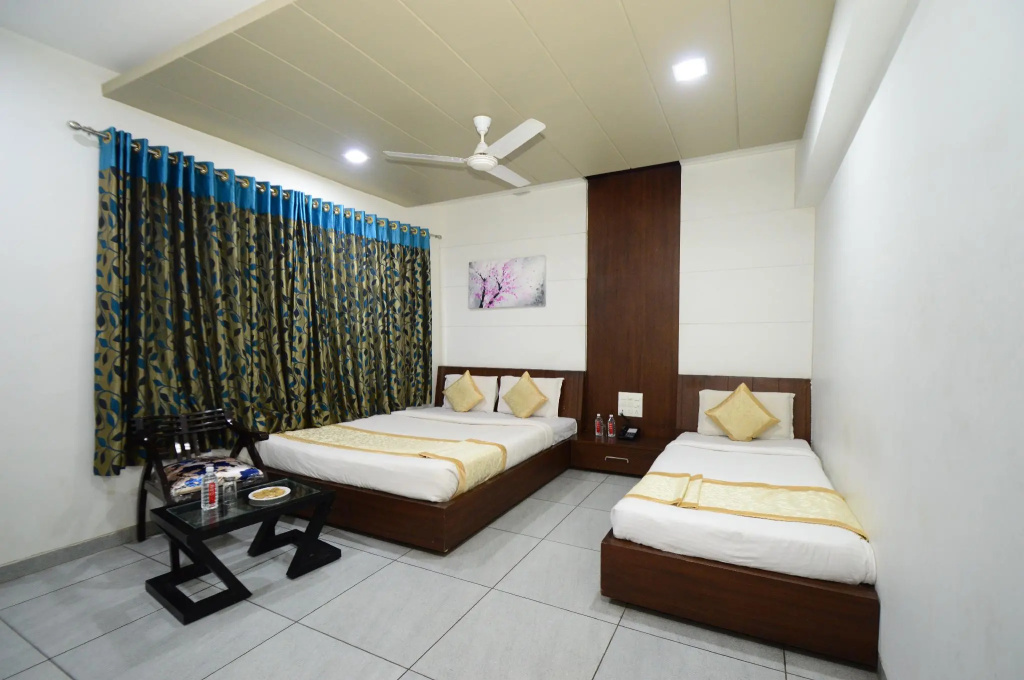 Crimson Park Shripriya Hotel - Chambres