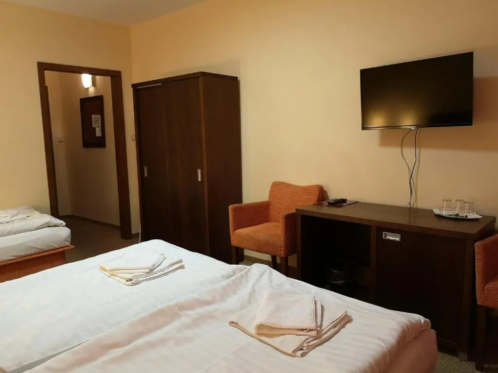 Garni Hotel Cosmopolitan - Chambres