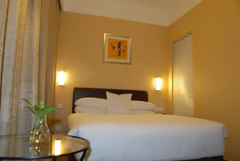 Gloria Plaza Hotel Kangqiao - Chambres