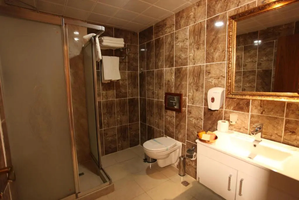 Tughan Hotel - Chambres
