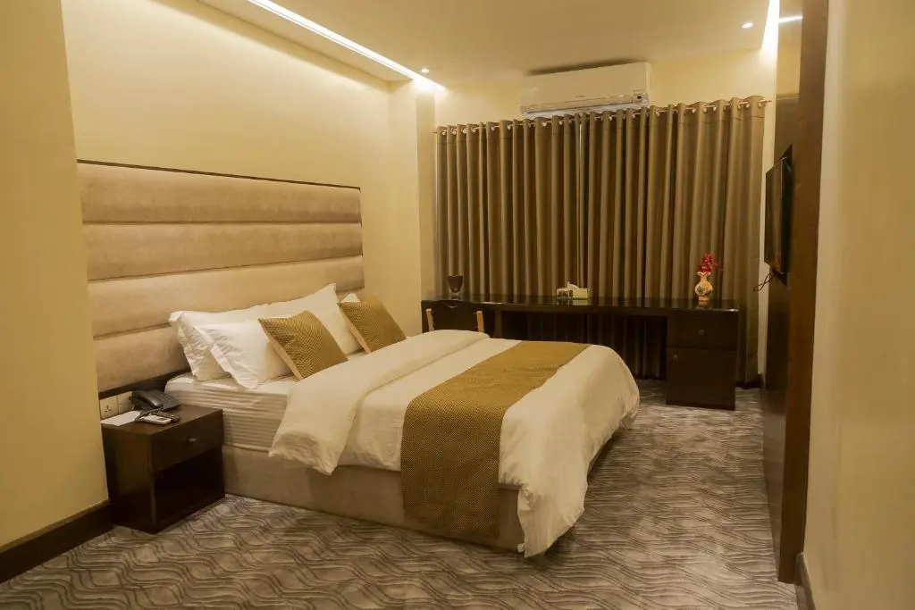 Richmond Hotel & Apartments - Chambres