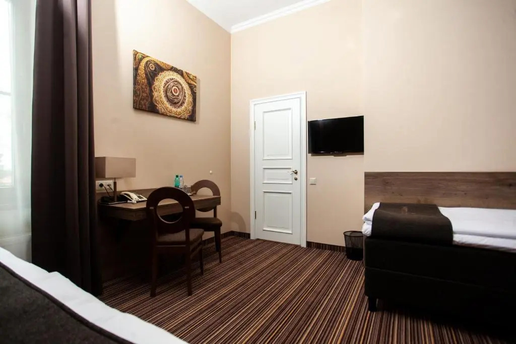 Hotel Cesis - Chambres