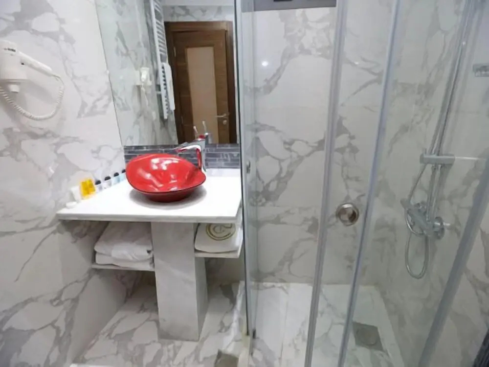 Delora Hotel and Suites - Chambres