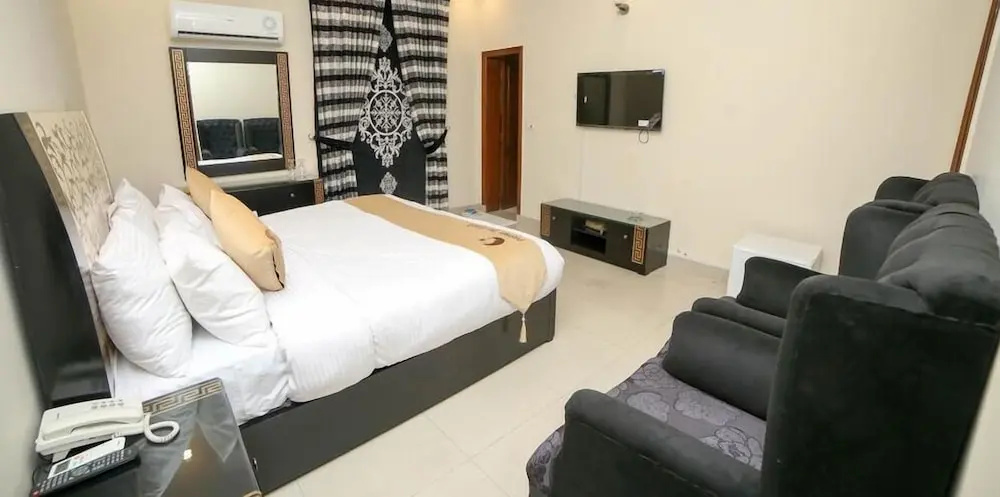 Hotel Premier Inn Grand - Chambres