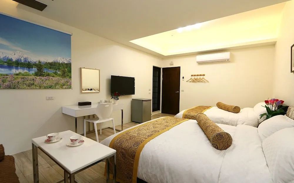 豪華四人房，配有雙人床