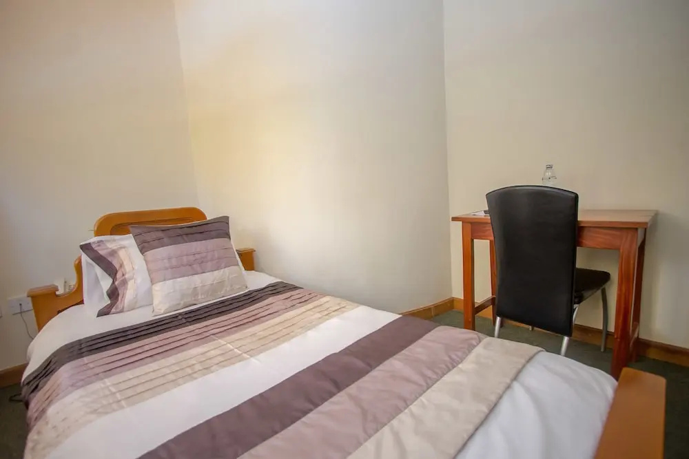 Crown Suites Hotel - Chambres