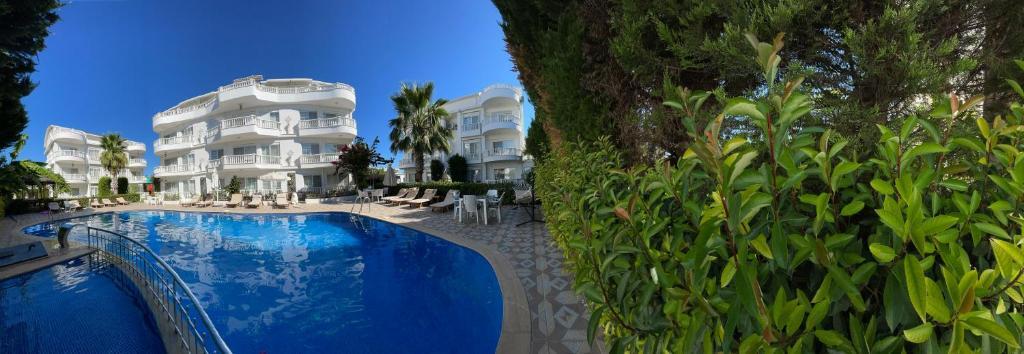 Апартаменты с видом на бассейн в BELKA GOLF RESİDENCE apt8 / BELEK
