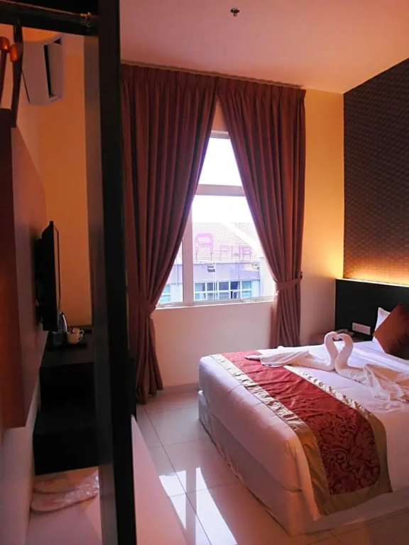 Supreme Hotel - Chambres