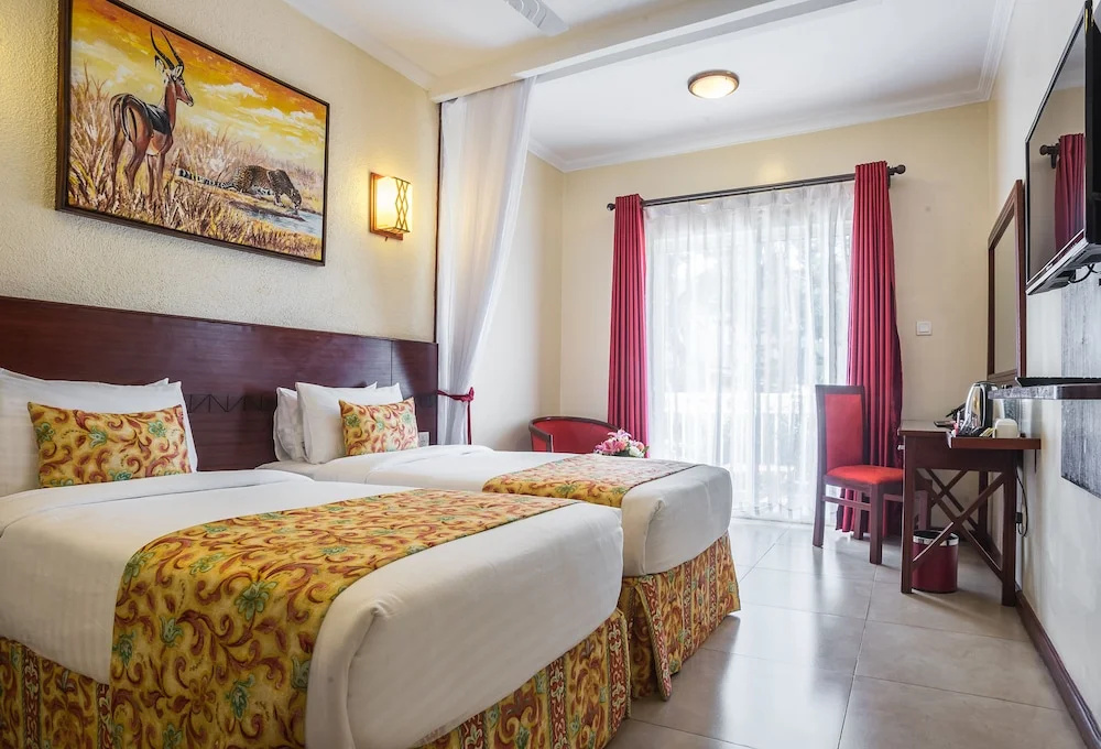 PrideInn Hotel Raphta - Chambres