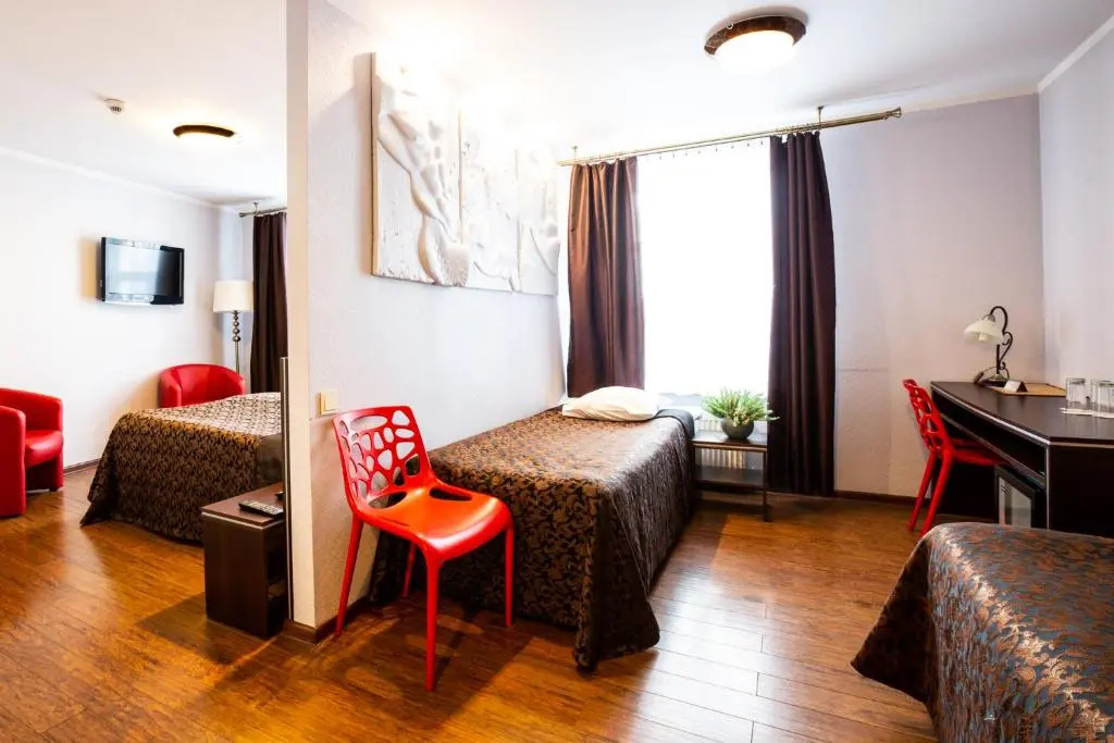 Primo Hotel - Chambres