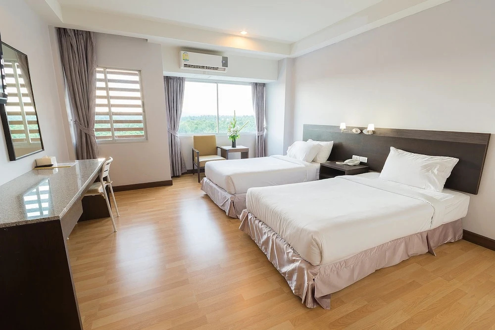 Sinkiat Buri Hotel - Chambres