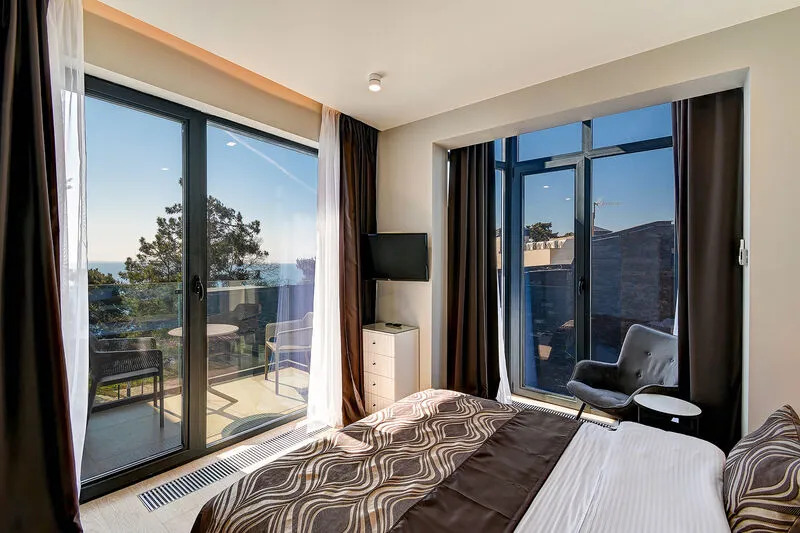 Двухместный номер Deluxe с видом на море двуспальная кровать в Real Apartments Sochi