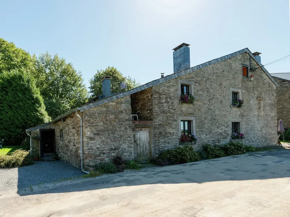 Farmhouse Situated at the Edge of the Woods