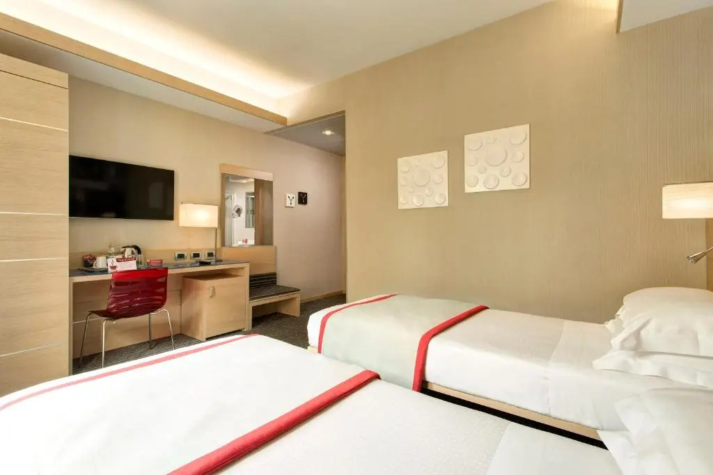 iQ Hotel Roma - Chambres