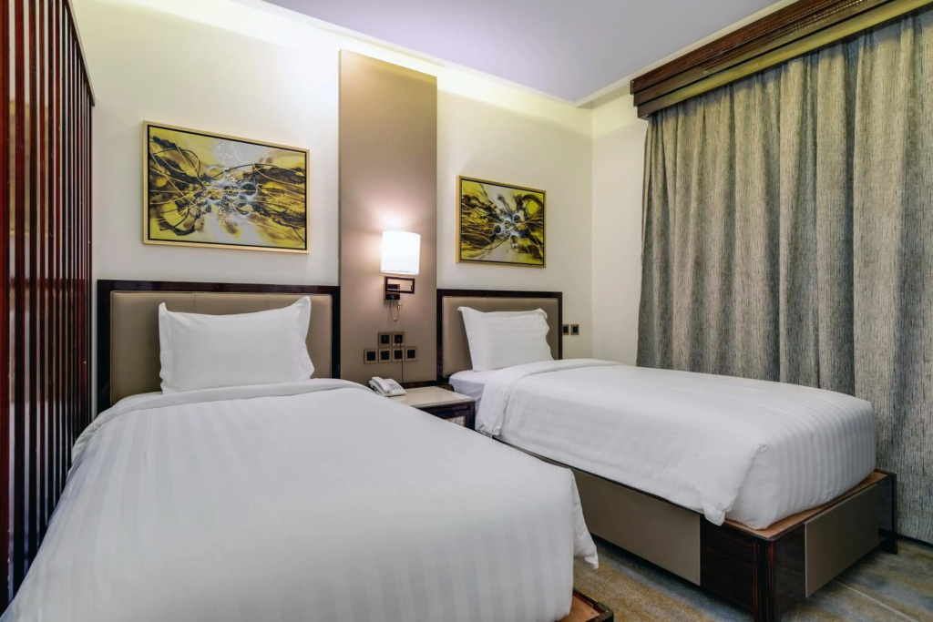Al Ertiqaa Hotel — 4