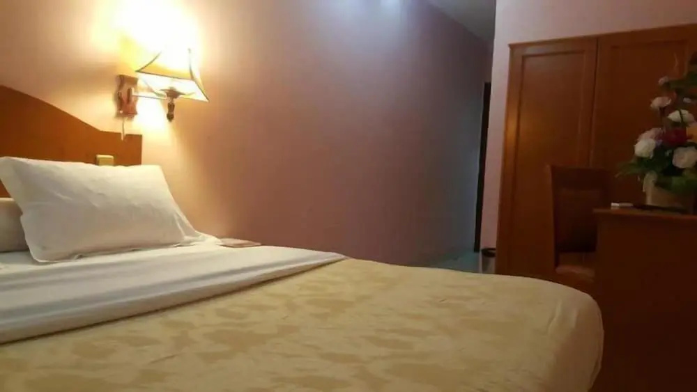 Peninsula Plaza Hotel - Chambres