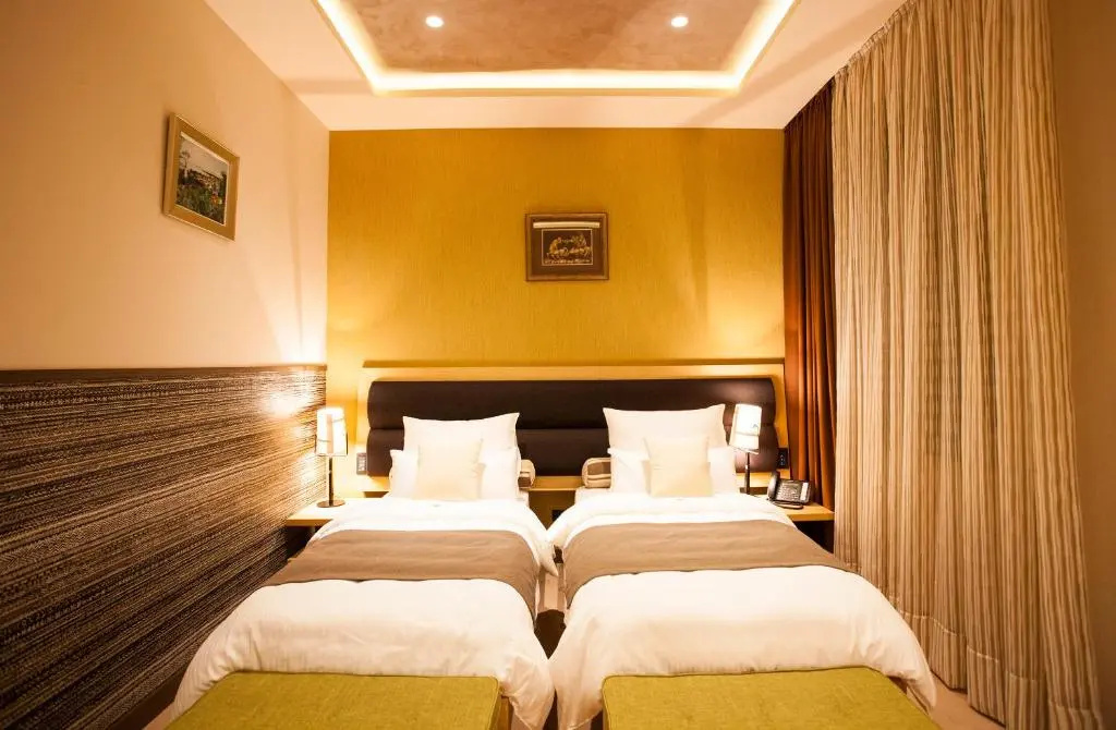 Atera Business Suites - Chambres